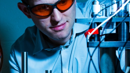 Jonathan Singer working with lab equipment