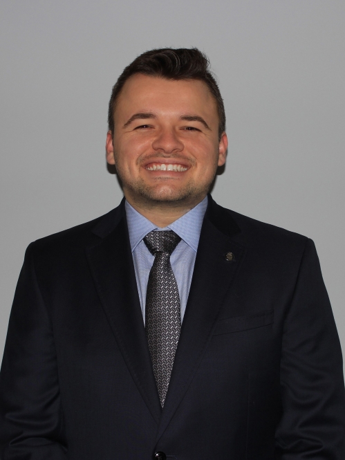 man wearing a black suit